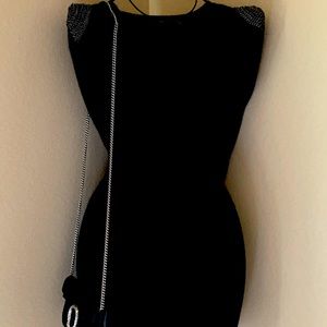 Sleek black sweater dress